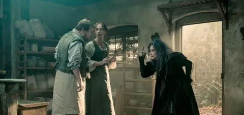 &ldquo;Into the Woods&rdquo; is a humorous and heartfelt musical that follows classic fairy tales&mdash;all tied together by an original story involving a baker and his wife (James Corden & Emily Blunt), their wish to begin a family and their interaction with the witch (Meryl Streep) who has put a curse on them. In theaters nationwide Dec. 25, 2014. Photo by: Peter Mountain. &copy; 2014 Disney Enterprises, Inc. All Rights Reserved.

